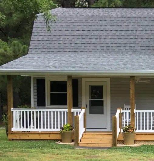 A home in NC with a new roof installed by Burroughs Roofing.