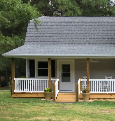 A home in NC with a new roof installed by Burroughs Roofing.